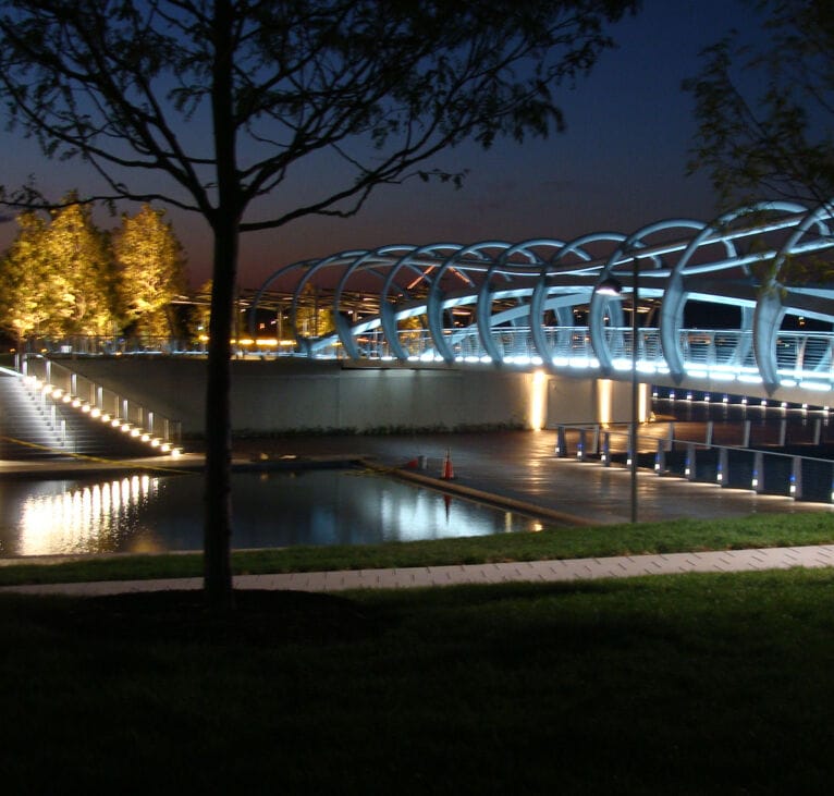 Lit bridge at night